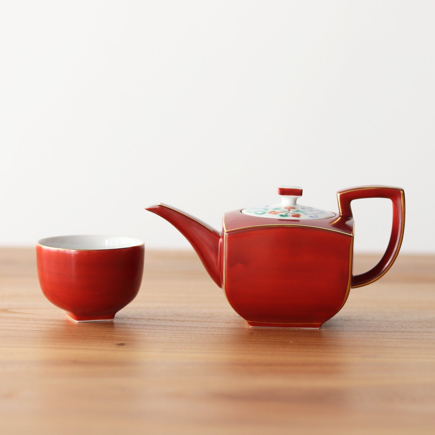Red Scroll Handled Teapot and Cup Set